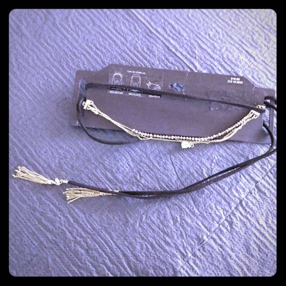 Versatile choker/bracelet/necklace with tassels.